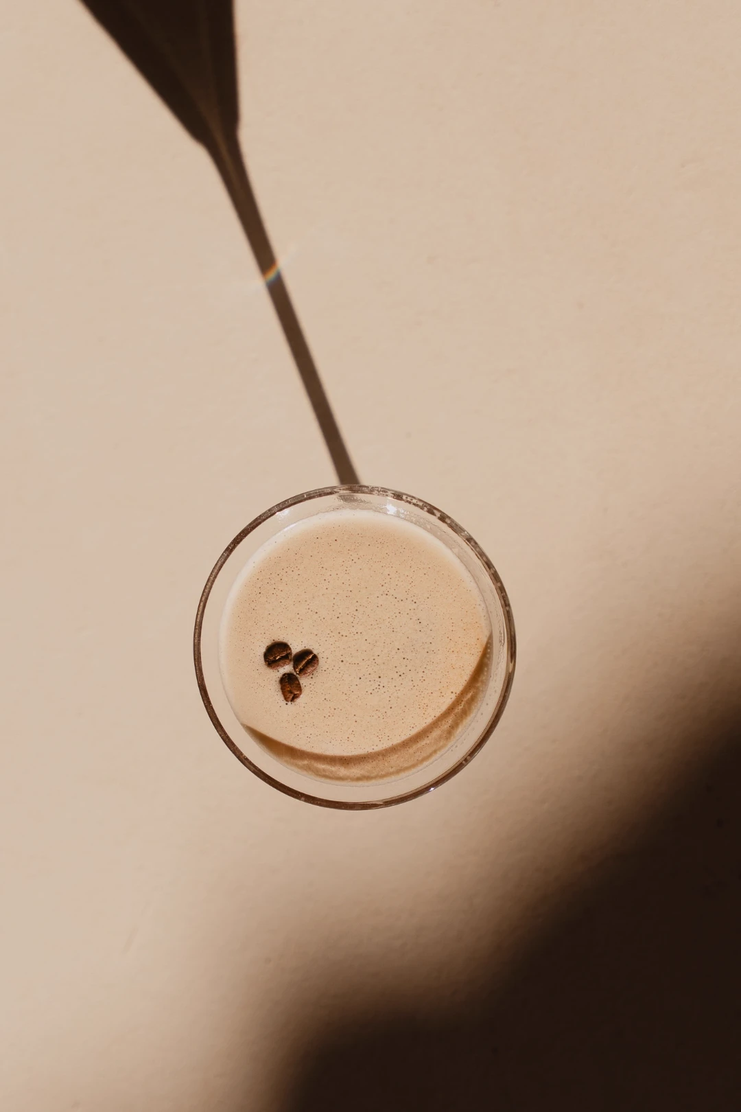 Espresso martini with coffee beans, shot from above