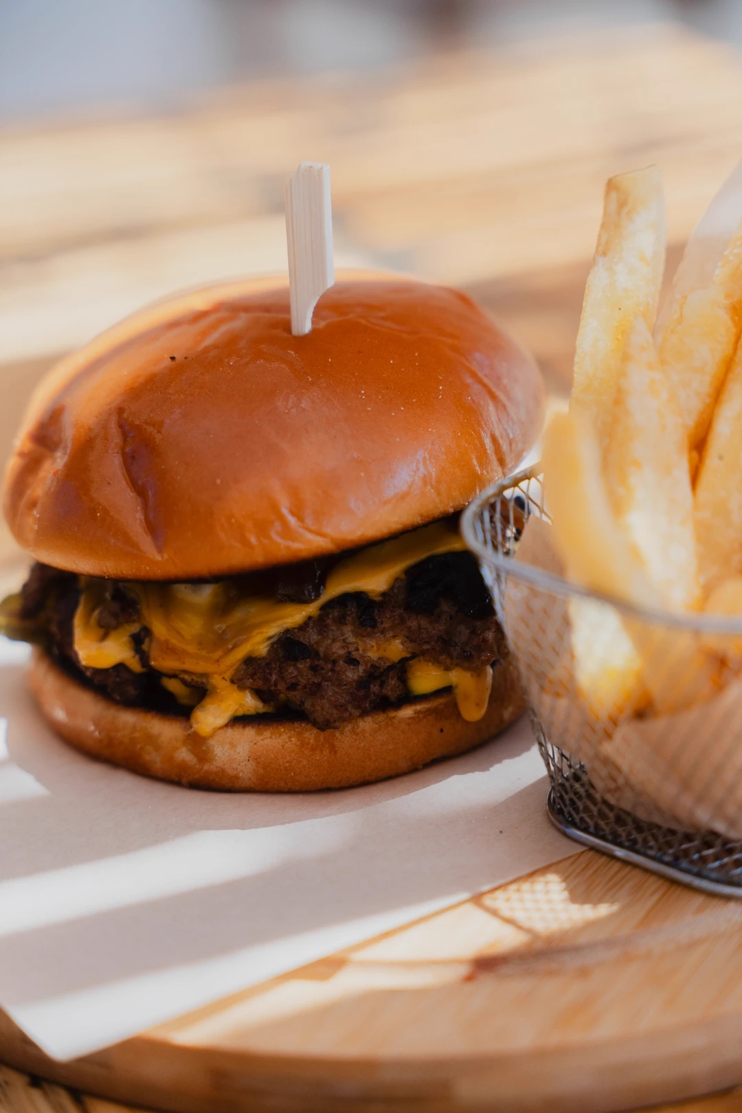 Cheeseburger with a side of crispy fries